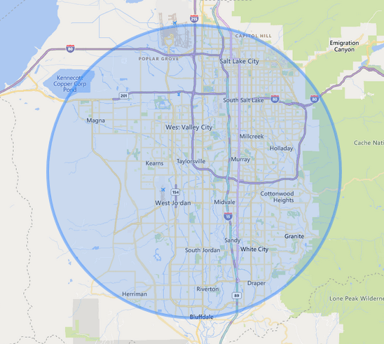 A photo of a map of the Salt Lake Valley with a blue circle to show Cruzin Bee LLC's service area radius in Utah. The circle extends North to Capitol Hill/Salt Lake, West to Magna, South to Bluffdale, and East to Holladay.